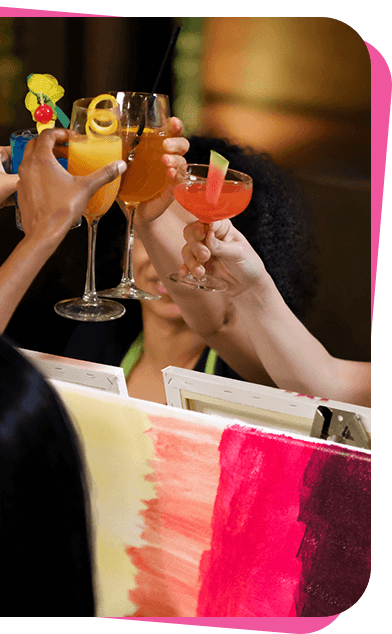 Friends cheersing around a table at a Yaymaker Plant Nite event