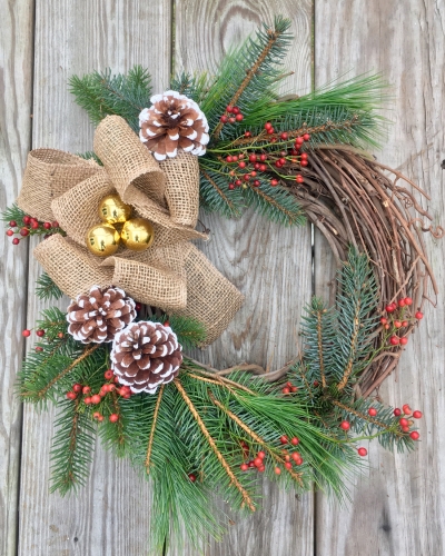 A Winter Wreath w live evergreen and burlap bow plant nite project by Yaymaker