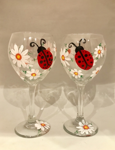 A Ladybug Luck Wine Glasses paint nite project by Yaymaker