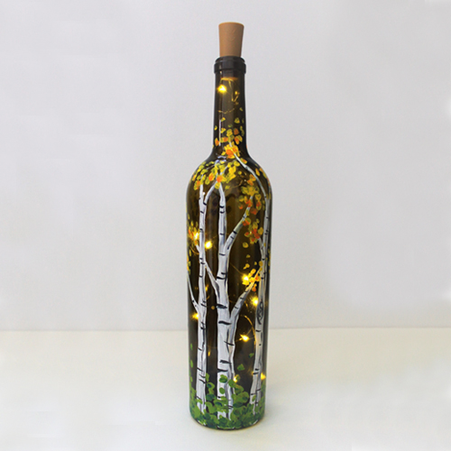 A Falling for Birches Wine Bottle with Fairy Lights paint nite project by Yaymaker