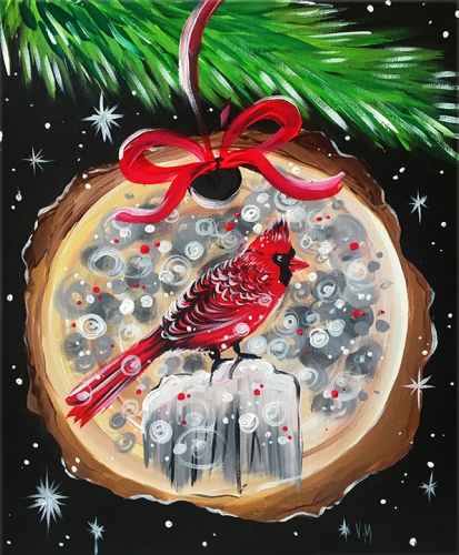 A Christmas ornament with a bird paint nite project by Yaymaker