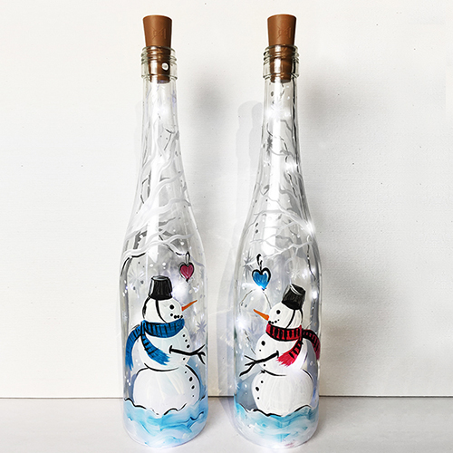 A Snowmen Love Story Wine Bottle with Fairy Lights paint nite project by Yaymaker