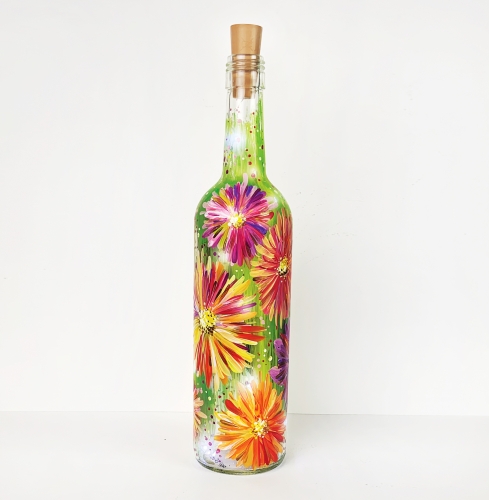 A Daisy Field Wine Bottle with Fairy Lights paint nite project by Yaymaker