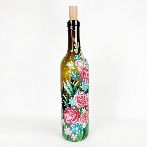 A Roses and Daisies Wine Bottle with Fairy Lights paint nite project by Yaymaker