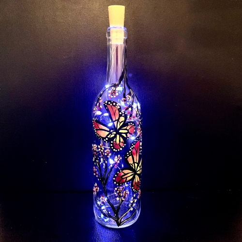 A Beautiful Butterfly On A Wine Bottle paint nite project by Yaymaker