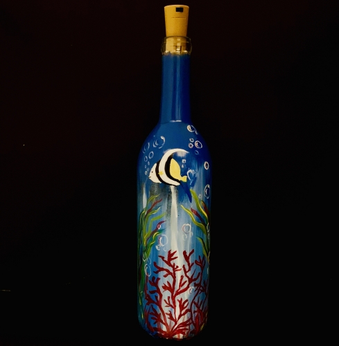 A Deep Blue Sea Wine Bottle with Twinkling Lights paint nite project by Yaymaker