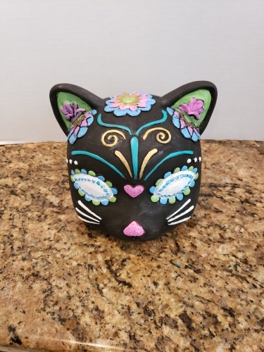 A Halloween Cat  Day of the Dead ceramic painting project by Yaymaker