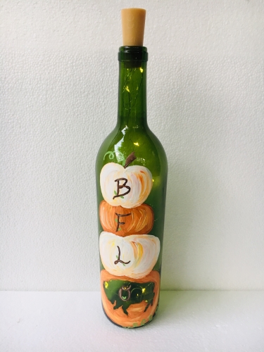 A BufFALLo Wine Bottle w Fairy Lights paint nite project by Yaymaker