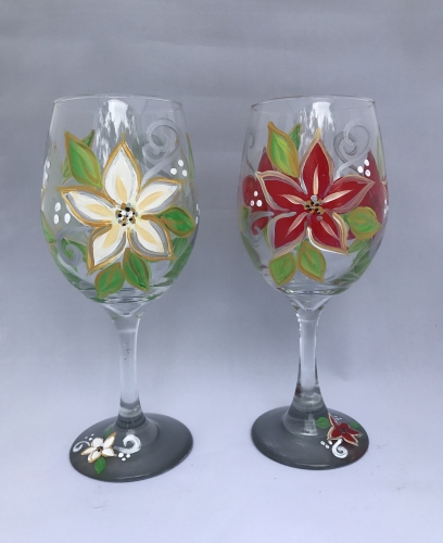 A Poinsettia Elegance Wine Glasses paint nite project by Yaymaker
