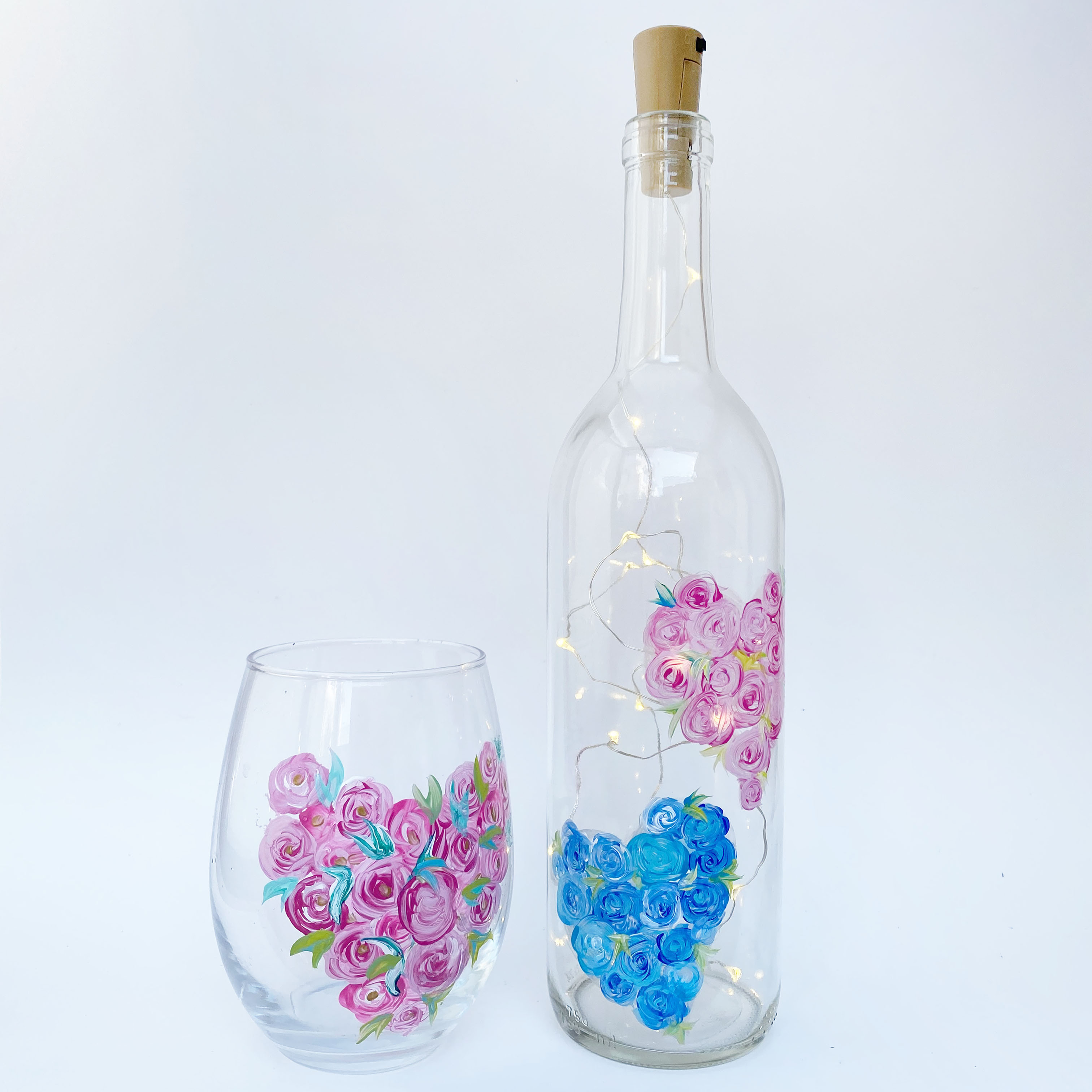 A Floral Hearts Wine Bottle and Pink Stemless Wineglass experience project by Yaymaker