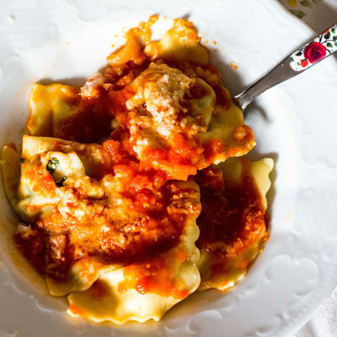 A Homemade ricotta spinach ravioli in tomato sauce experience project by Yaymaker